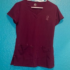 Scrub with breast cancer logo